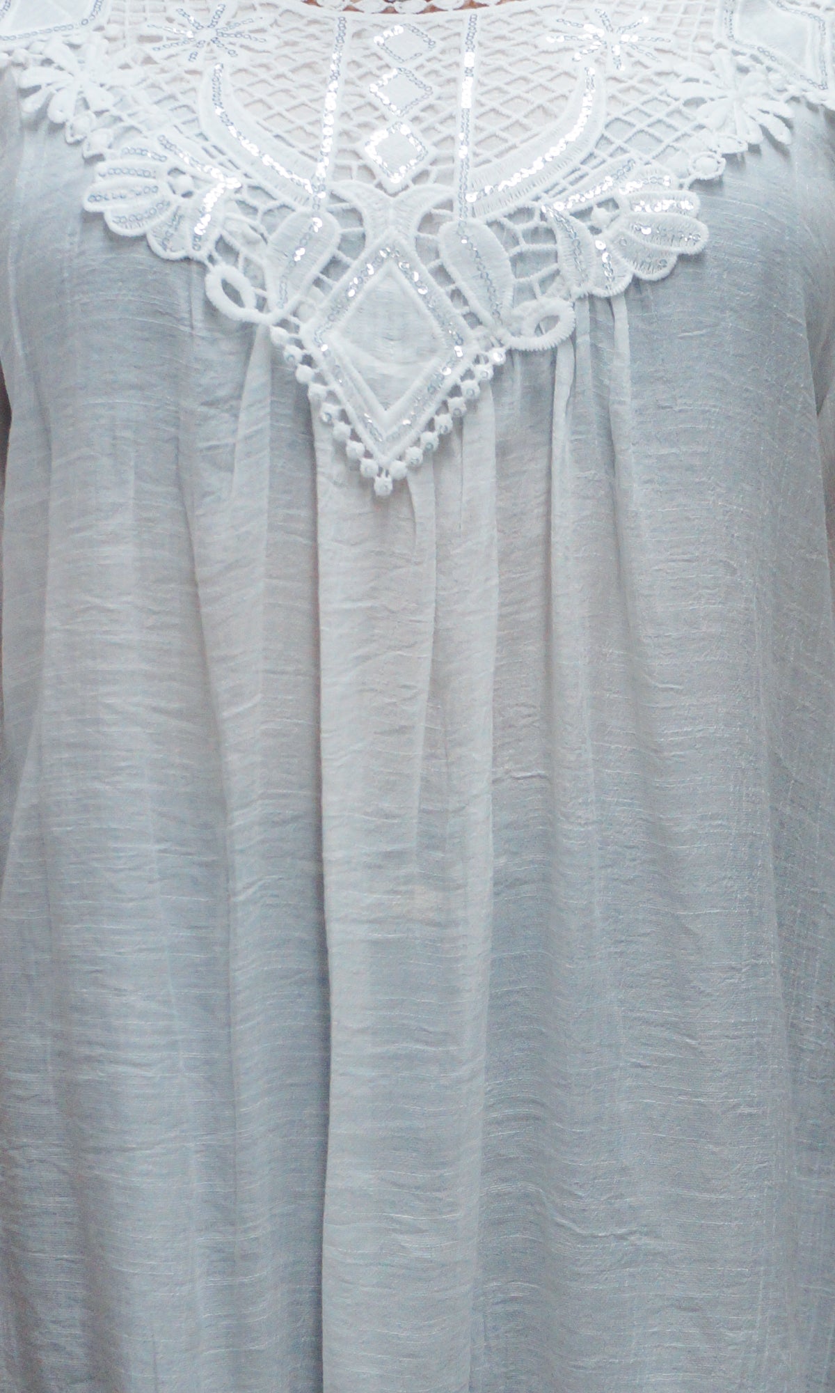 Blusa con aplicación. MOD. RT-172